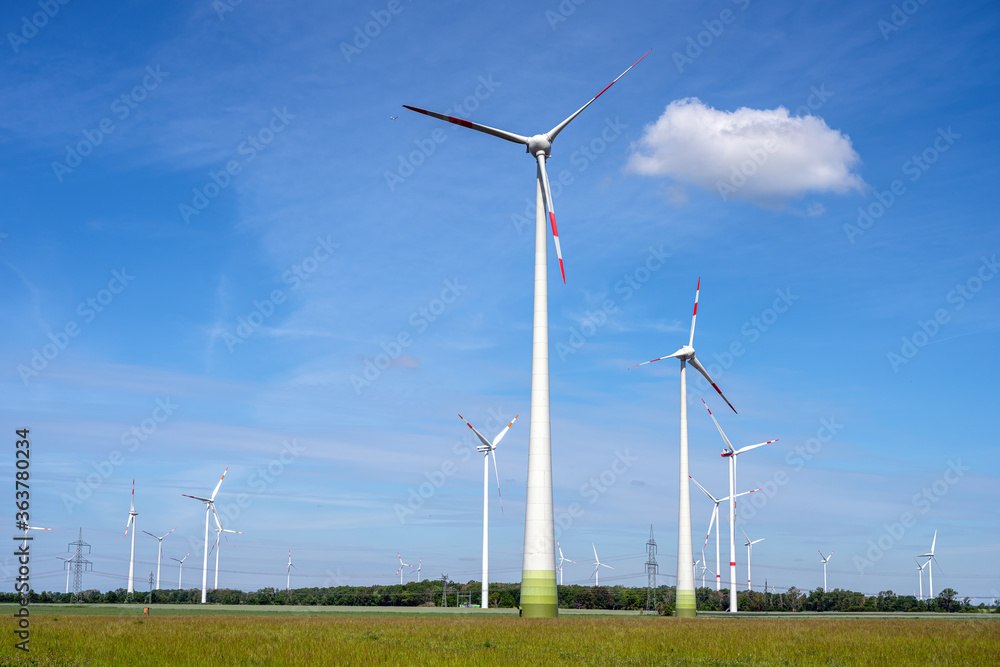 Modern wind energy turbines seen in rural Germany Modern wind energy turbines seen in rural Germany