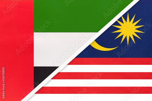 United Arab Emirates or UAE and Malaysia  symbol of national flags from textile. Championship between two countries.