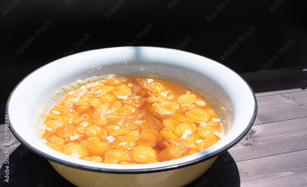 Apricot jam on a wooden background Apricot jam on a wooden background