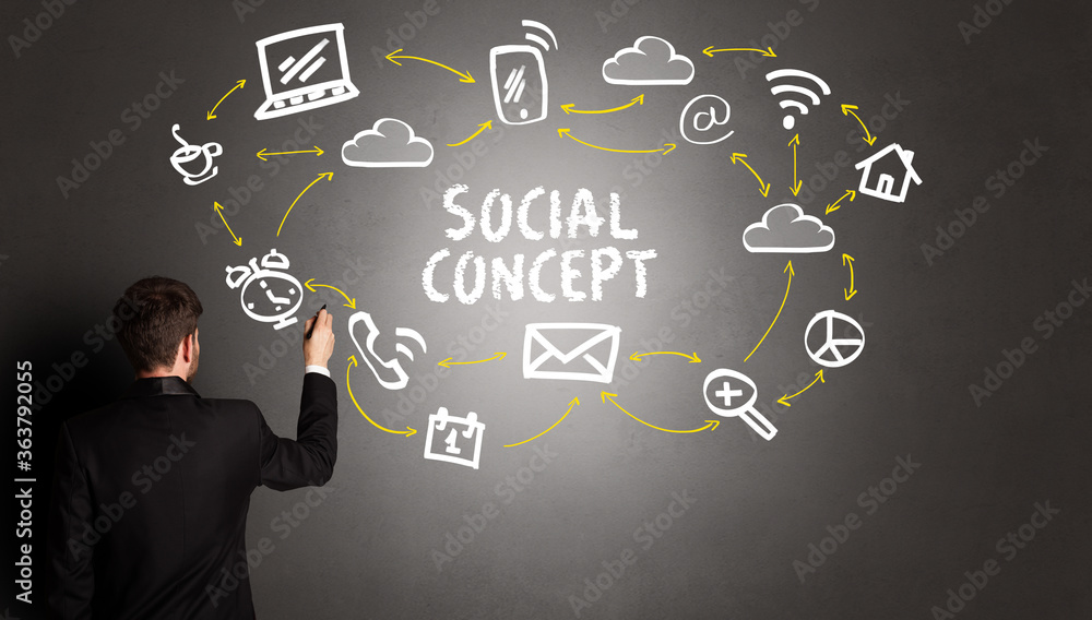businessman drawing social media icons with SOCIAL CONCEPT inscription, new media concept businessman drawing social media icons with SOCIAL CONCEPT inscription, new media concept