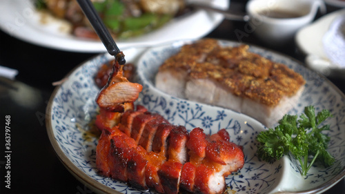 Obraz na plátně Chopsticks honey barbecue pork crispy Hong Kong Cantonese traditional cuisine