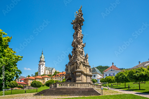 View at the Plague Column of Holy trinity with Town Castle in Kremnica, Slovakia