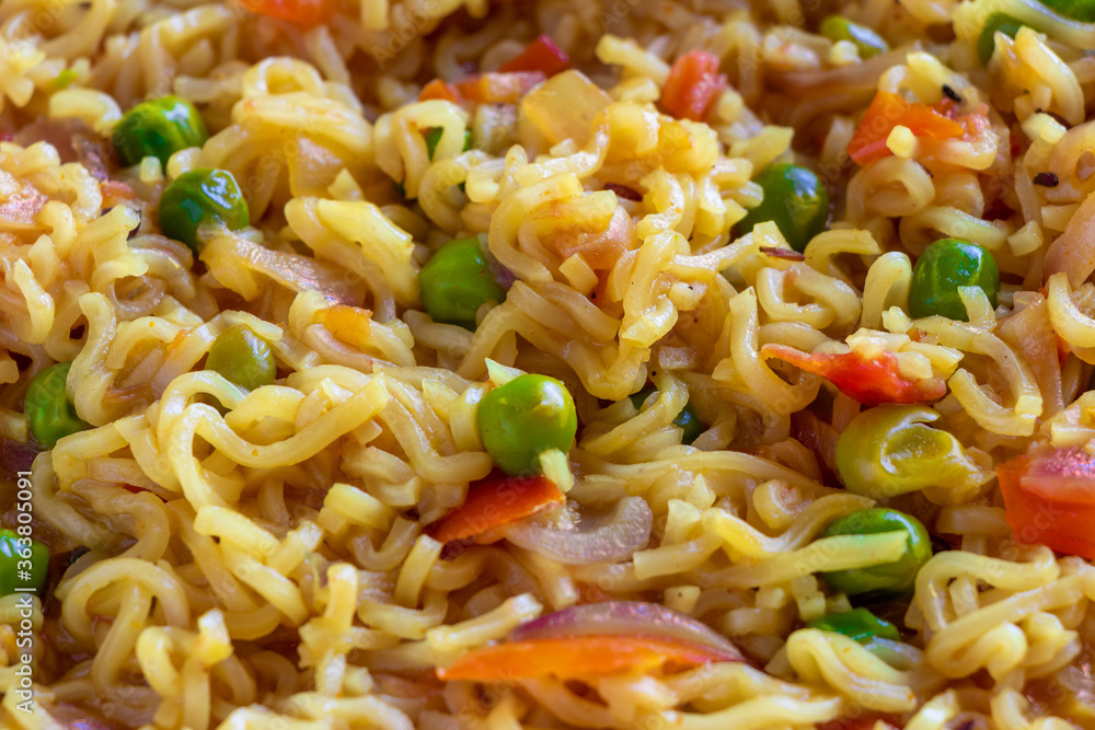 Spicy fried instant noodles, close up view Spicy fried instant noodles, close up view