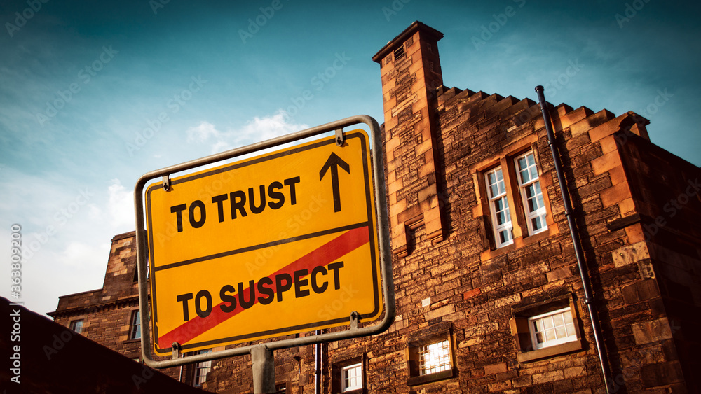 Street Sign TO TRUST versus TO SUSPECT Street Sign TO TRUST versus TO SUSPECT