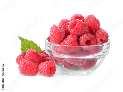 Delicious fresh ripe raspberries in bowl isolated on white