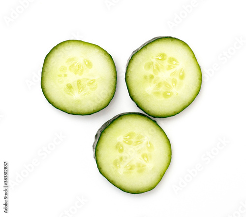 Fresh cucumber slice isolated on a white background