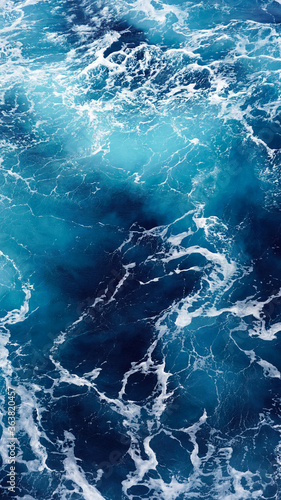 Background of the sea surface, foam stains on clean fresh ocean water. Vertical photo aerial view © Artem