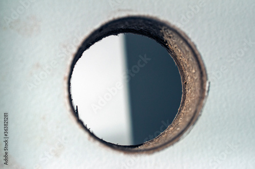 Round hole drilled in a door