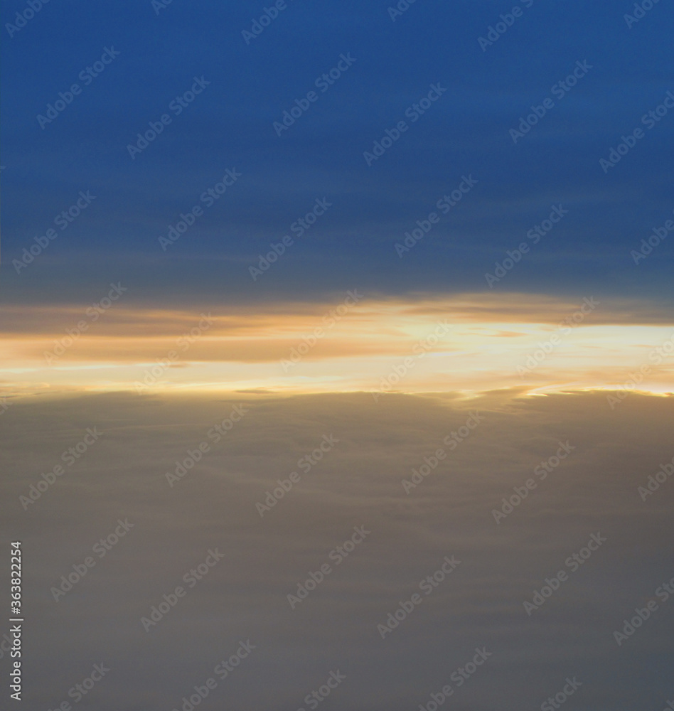 A processed photo of a beautiful sky like a sea of clouds at sunset or sunrise. A processed photo of a beautiful sky like a sea of clouds at sunset or sunrise.
