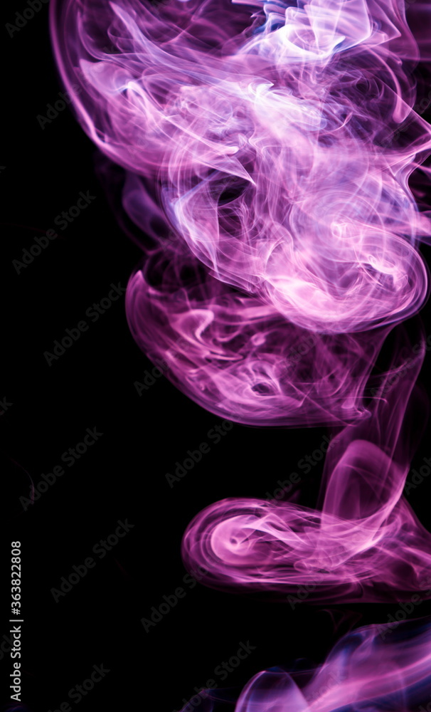 Fototapeta premium Purple smoke on black background