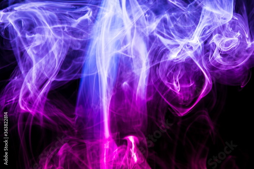 Colored smoke on black background