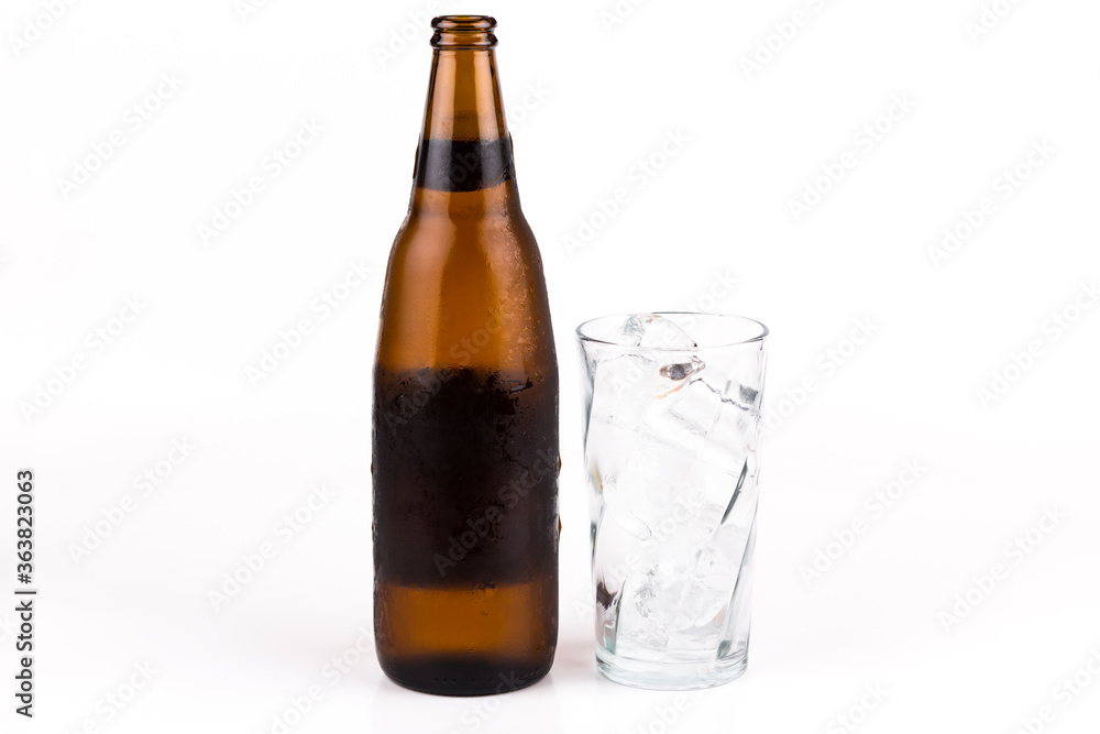 Glass of beer on ice on white background Glass of beer on ice on white background