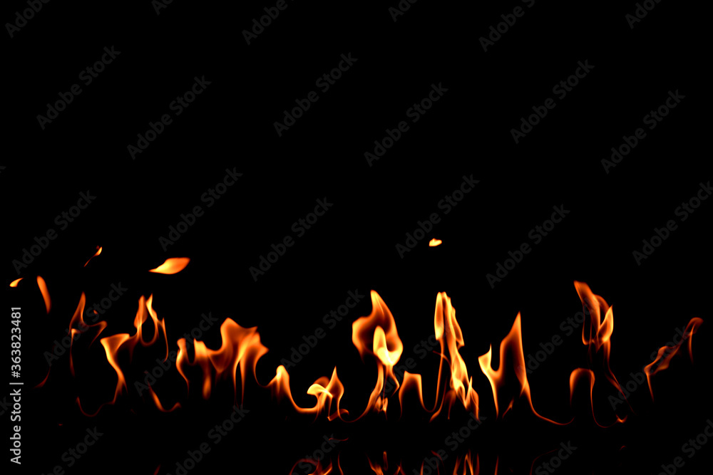 Beautiful bright fire flames on black background Beautiful bright fire flames on black background
