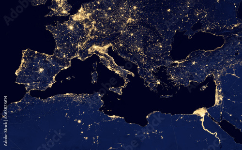 Fototapeta Naklejka Na Ścianę i Meble -  earth at night, view of city lights in Europe and north africa region arround  Mediterranean Sea from space. Elements of this image furnished by NASA. 