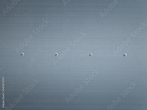 Threw a cloth with small rivets