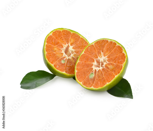 Fototapeta Naklejka Na Ścianę i Meble -  tangerine or mandarin fruit with leaves isolated on white background