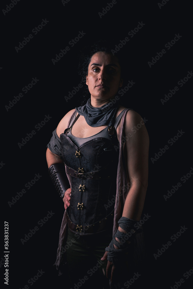 medieval woman shooting in dark studio medieval woman shooting in dark studio