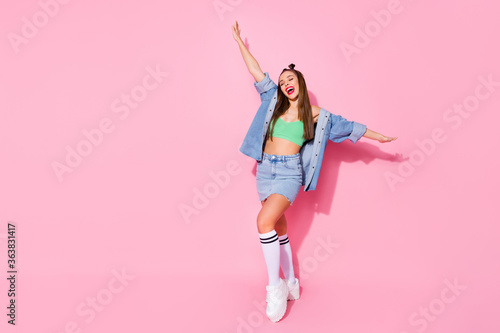 Full length body size view of her she nice attractive lovely glamorous trendy fit glad cheerful girl having fun enjoying vacation season wear shadow isolated over pink pastel color background