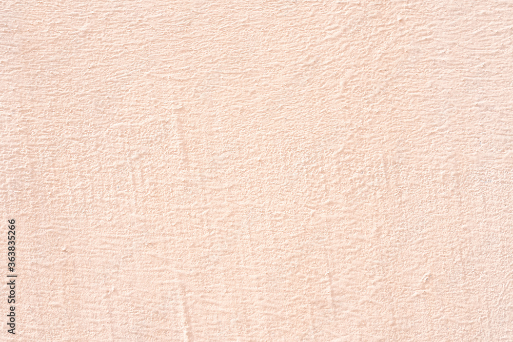 Fototapeta premium Pink stucco texture. Designer interior background. Abstract architectural surface.