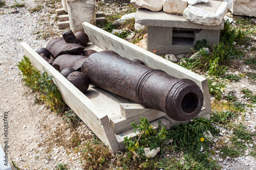 Old broken bronze canon gun