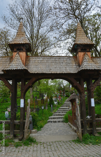 DESESTI, MARAMURES, ROMANIA, SUMMER 2018. Entrance to the beautiful wooden orthodox church of San Parascheva or Desesti, Unesco World Heritage.