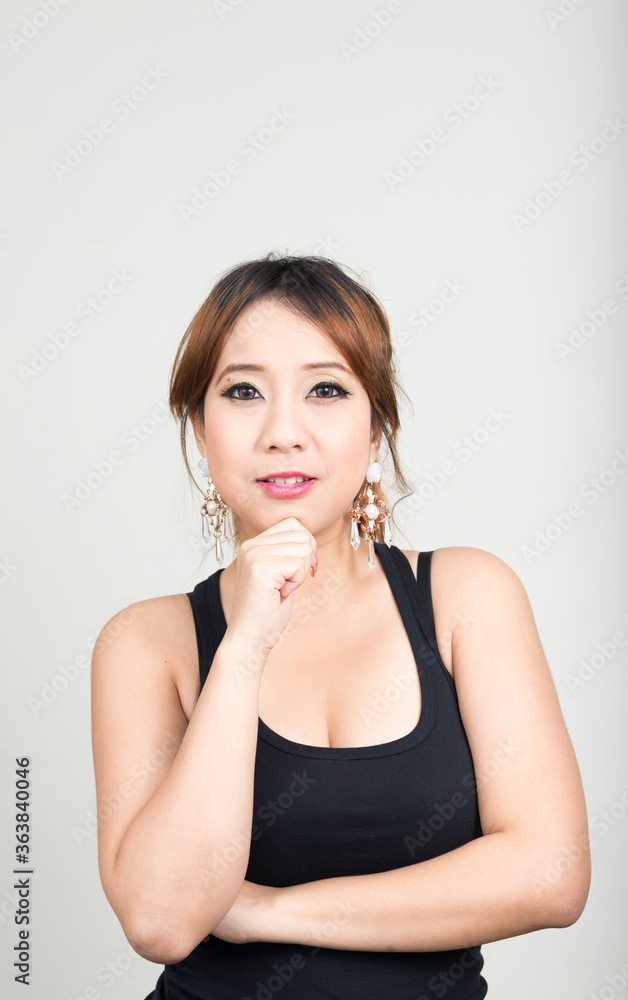 Portrait of happy beautiful Asian woman thinking ready for gym Portrait of happy beautiful Asian woman thinking ready for gym