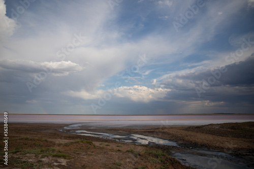 Cumulonimbus clouds above the Pink salt Lake Kobeituz in north Kazakhstan's Akmola Region.
