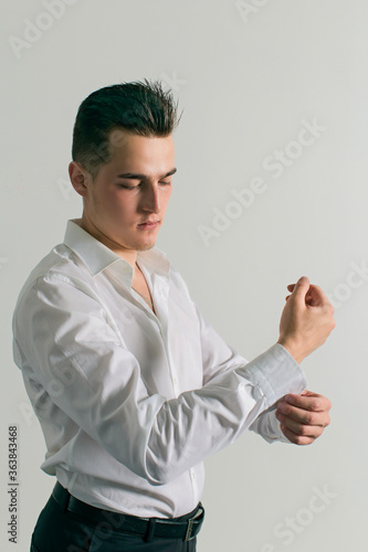 young man in a white shirt
