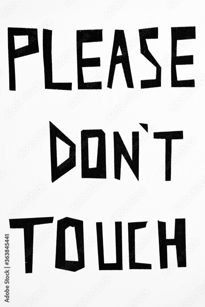 Obraz premium White wall with Please Don't Touch sign as written instruction