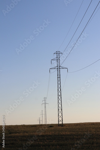 high voltage power lines - blue sky