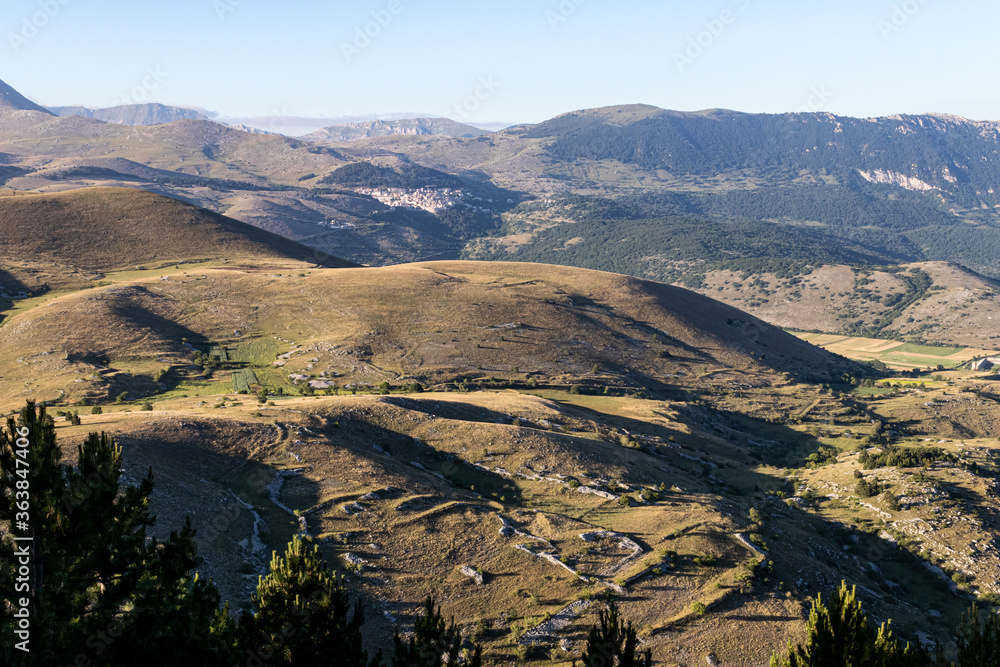 Mountain landscape with sunstar and golden light. Peaceful background and relax landscape. Toursim in mountain