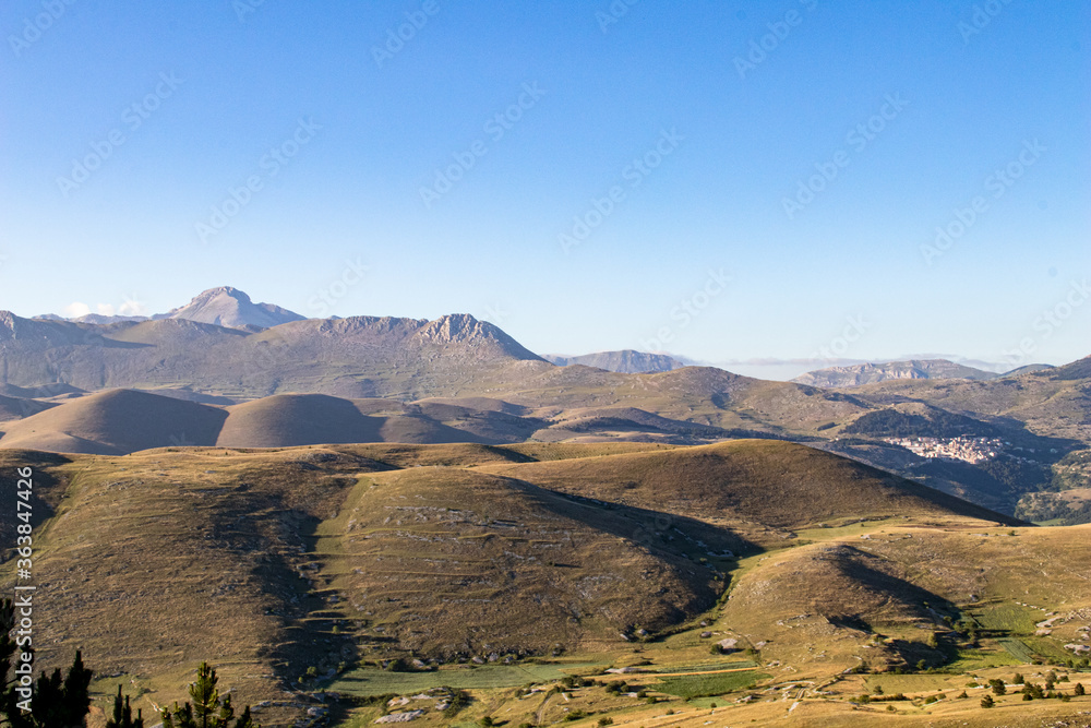 Mountain landscape with sunstar and golden light. Peaceful background and relax landscape. Toursim in mountain