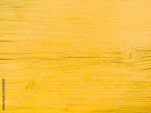wood surface with yellow color paint