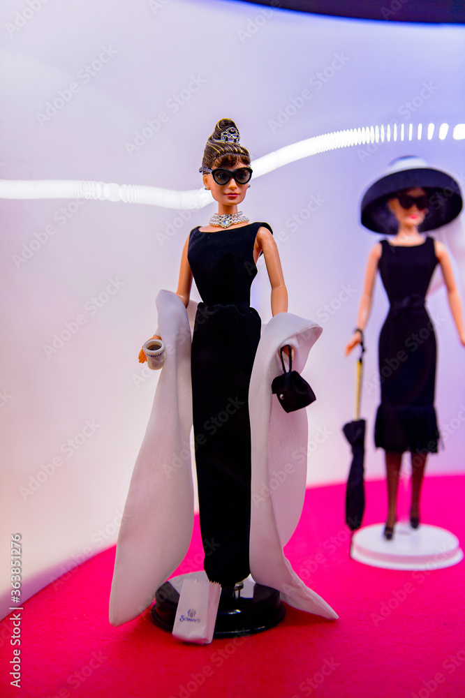 ROME, ITALY - MAY 7, 2016: Barbie doll as Audrey Hepburn at the Barbie doll  exhibition in Rome. Barbie brand belongs to the American toy-company  Mattel, Inc Stock Photo | Adobe Stock