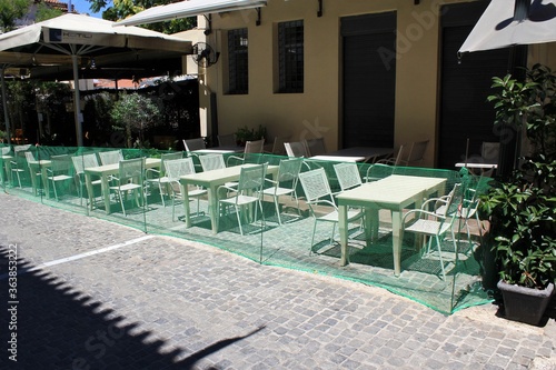 Greece, Athens, June 28 2020 - Closed bar-restaurant in the touristic district of Monastiraki, due to lack of customers.  photo