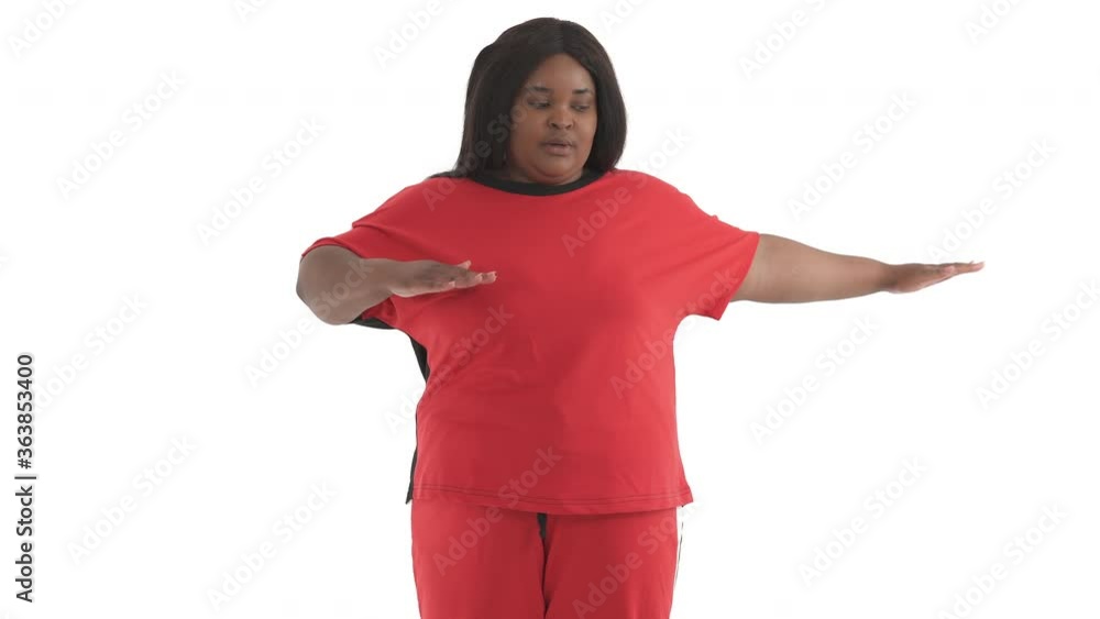 portrait of black plus size model doing cooldown stretching exercise isolated on white background portrait of black plus size model doing cooldown stretching exercise isolated on white background
