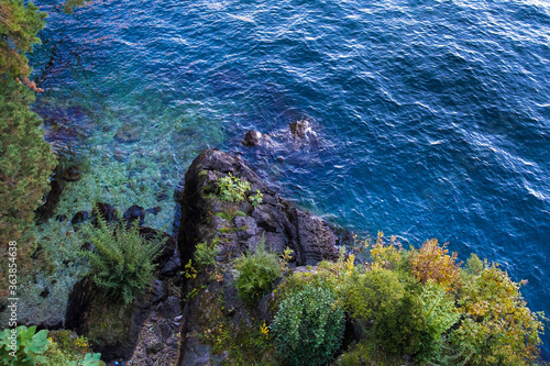 A beautiful view from the cliff in Norh Italy on summer, view from villa on Como lake. Good beautiful background.  photo