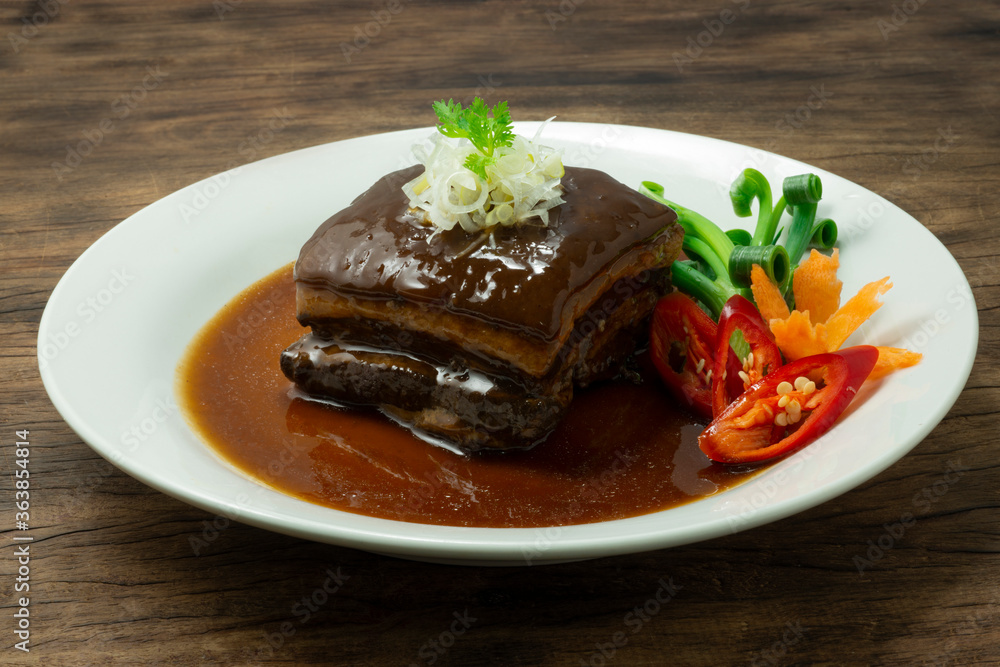 Belly in Brown Sauce ontop onion bunching cutlet slice Taiwanese Asian food Belly in Brown Sauce ontop onion bunching cutlet slice Taiwanese Asian food