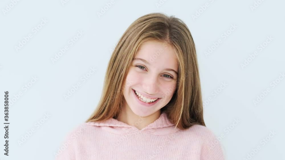 Portrait of happy teenage girl laughing Portrait of happy teenage girl laughing