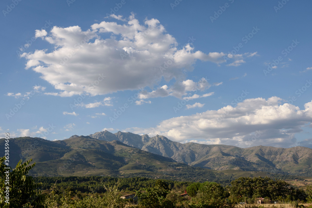 Views from Candeleda of the clouds in the sky over the Sierra de Gredos in Avila, Castilla Leon, Spain, Europe. Natural landscape.