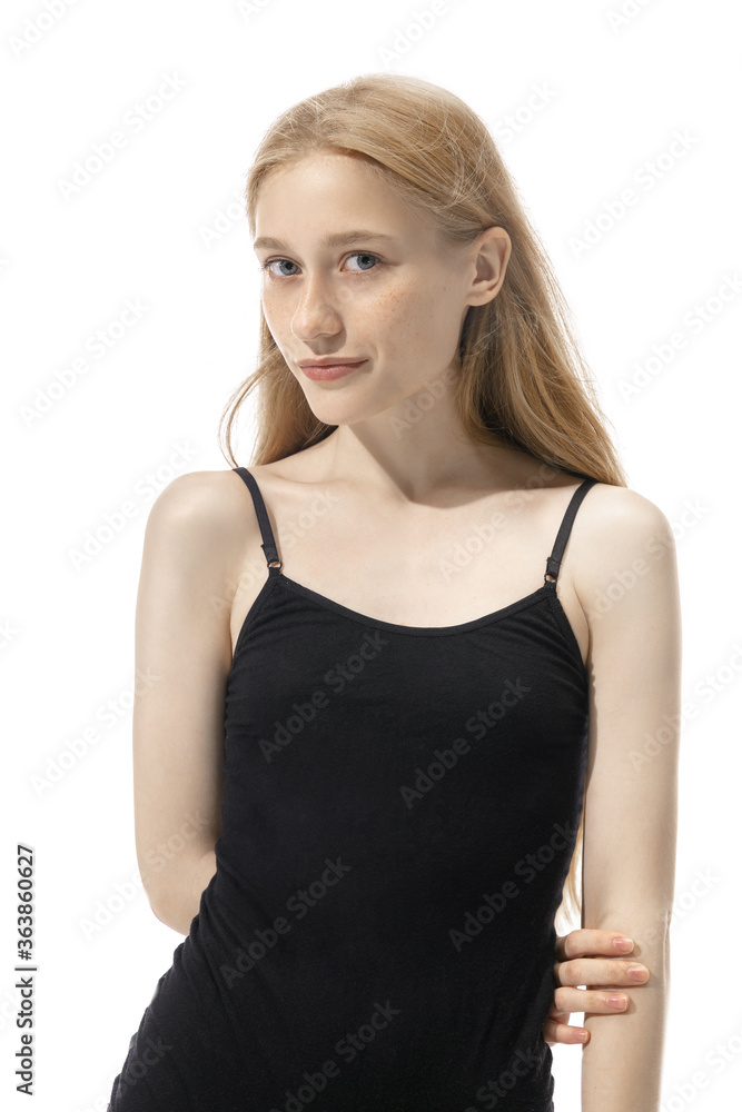 Portrait of beautiful redhead woman isolated on white studio background. Concept of beauty, skin care, fashion and style. Artwork, modern and trendy portrait. Attractive model in black bodysuit. Portrait of beautiful redhead woman isolated on white studio background. Concept of beauty, skin care, fashion and style. Artwork, modern and trendy portrait. Attractive model in black bodysuit.