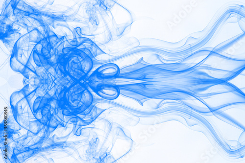 Blue smoke on white background, blue ink background, movement of blue smoke