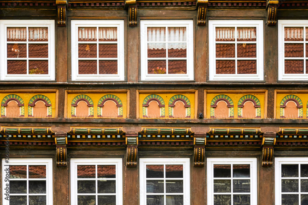 Obraz premium Artfully renovated half-timbered house, facade with carvings and paintings, Germany