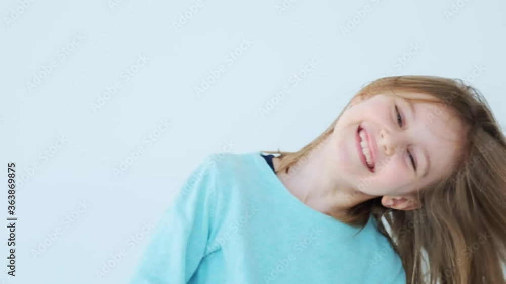 Cute little girl with streaming hair fooling Cute little girl with streaming hair fooling