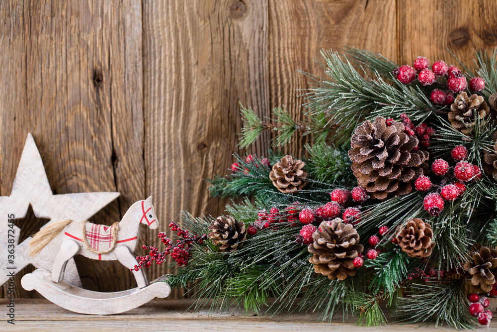 Christmas greeting card. Festive decoration on wooden background. New Year concept. Copy space. Flat lay. Top view. Christmas greeting card. Festive decoration on wooden background. New Year concept. Copy space. Flat lay. Top view.
