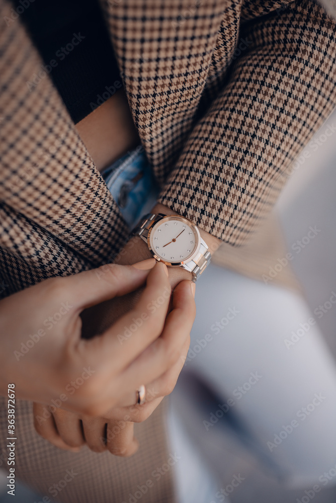 Elegant fashion stylish white watch on woman hand