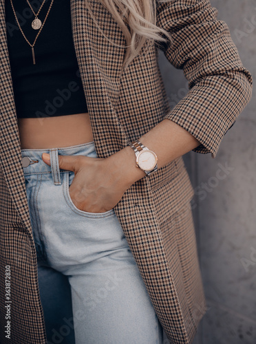 Stylish elegant white watch on woman hand