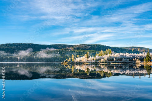 Panoramic landscape of Lake Schluchsee. Reflections on water