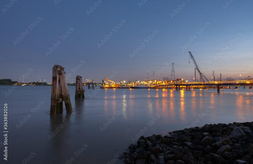 Long exposure image of the jetty of Lillo in the Port of Antwerp.