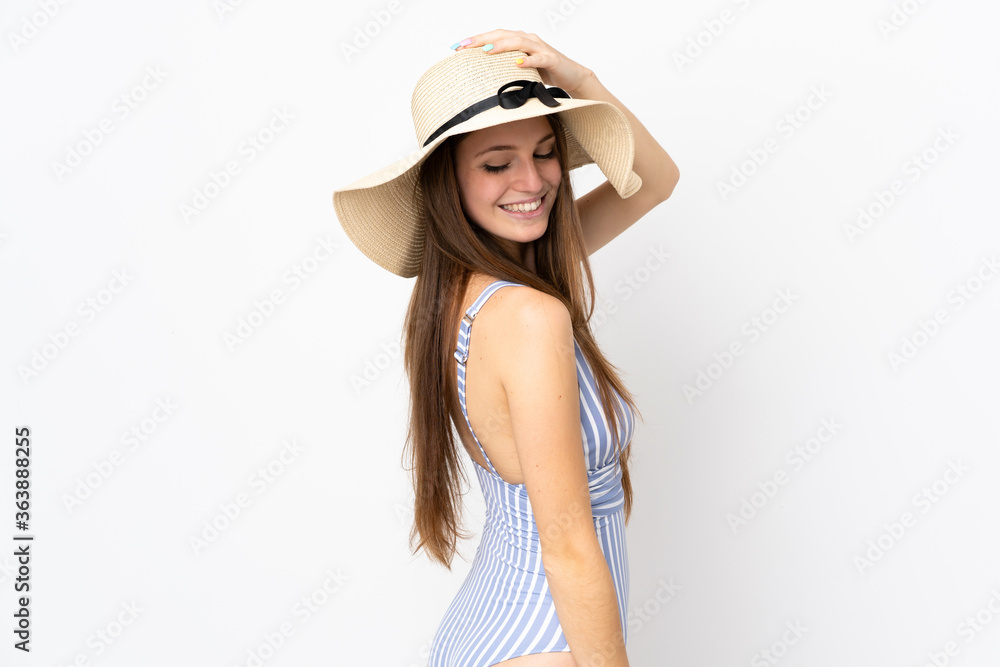 Young caucasian woman isolated on white background in swimsuit in summer holidays Young caucasian woman isolated on white background in swimsuit in summer holidays